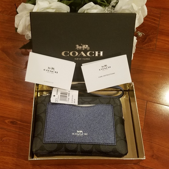 Coach Handbags - Coach Black/Blue Wristlet
